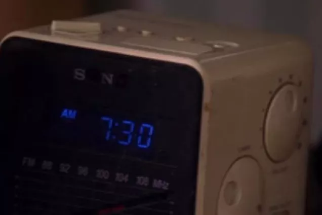 Clock radio showing 7:30. Photo.